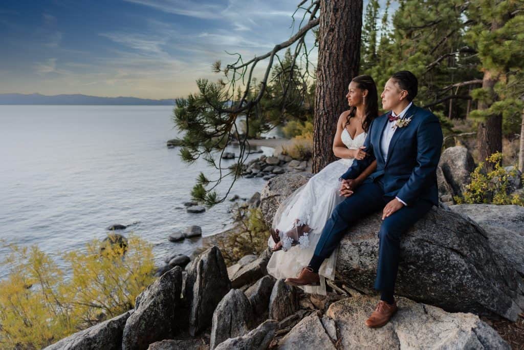 A couple looking at Lake Tahoe after their wedding